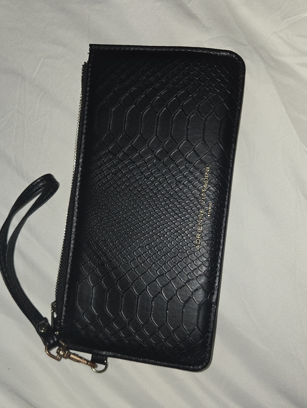 Adrienne Vittadini Black Embossed Zip-Around Wristlet - Picture 1 of 8